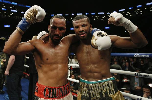 James DeGale and Badou Jack celebrate after their fight which ended in a draw