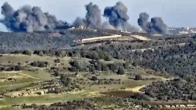 Smoke rises following what the Israeli military says is an Israeli strike on Hezbollah targets in a location given as Lebanon in this screengrab taken from a handout video