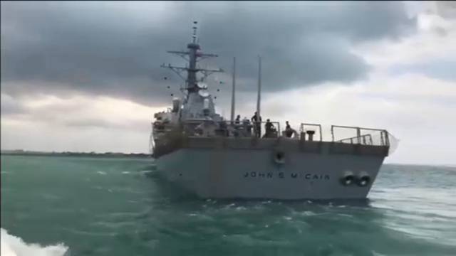 The U.S. Navy guided-missile destroyer USS John S. McCain is seen after a collision, in Singapore waters in this still frame taken from video