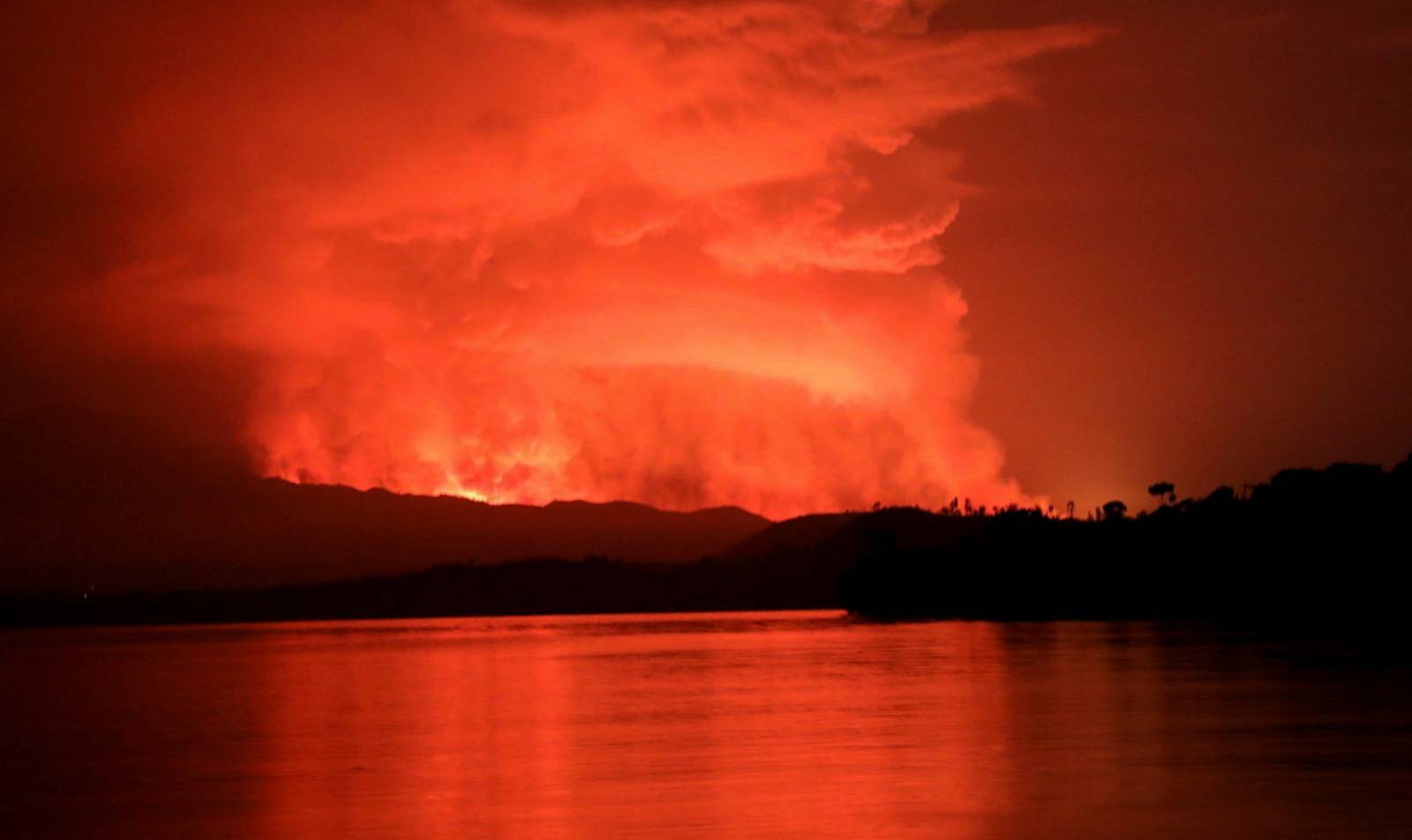 A general view shows smoke and flames at the volcanic eruption of Mount Nyiragongo near Goma