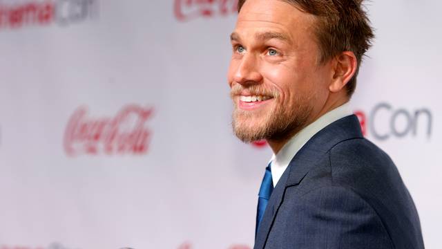 Actor Charlie Hunnam poses on the red carpet during CinemaCon, a convention of movie theater owners, in Las Vegas