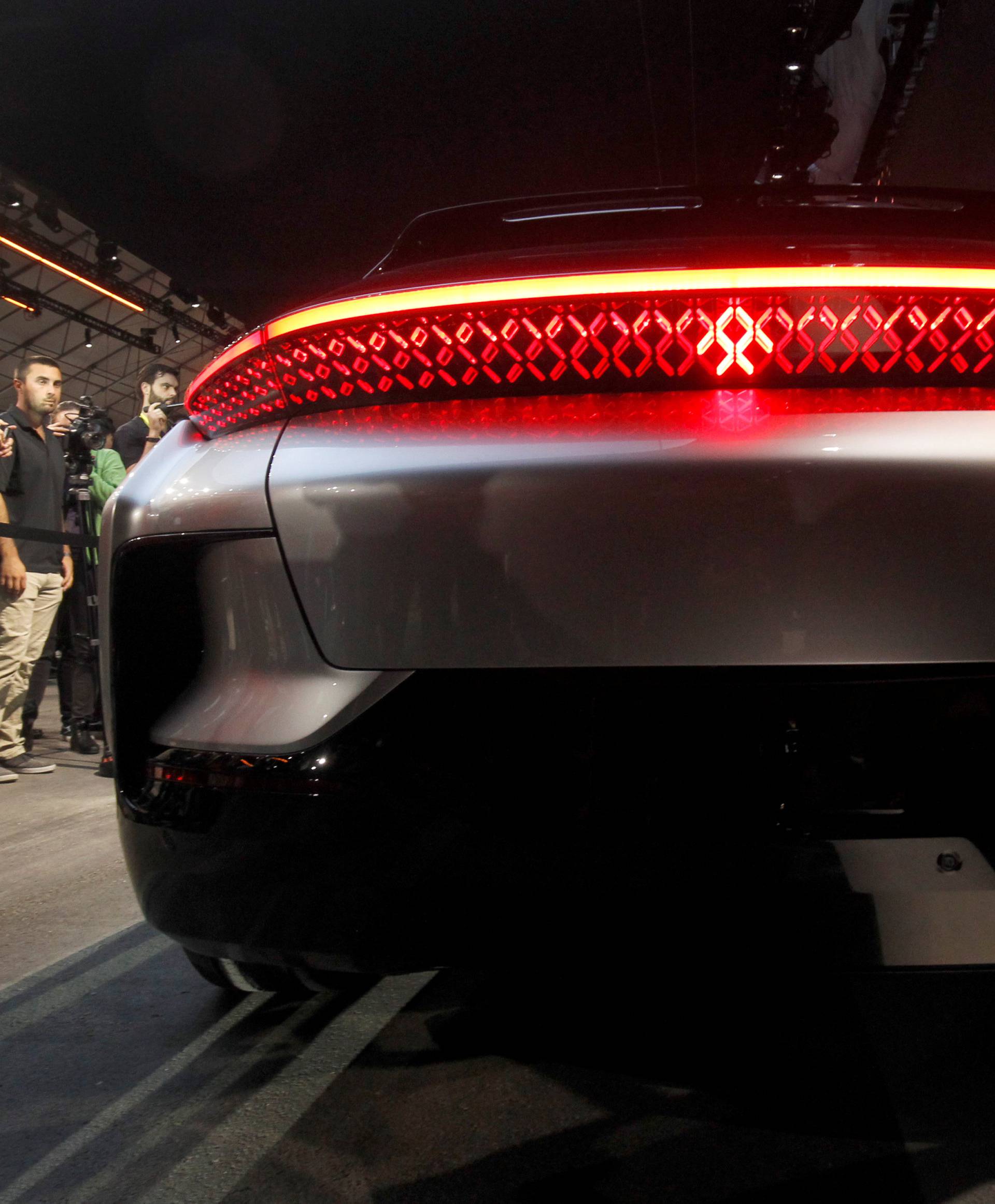 The rear of a Faraday Future FF 91 electric car is shown during an unveiling event at CES in Las Vegas