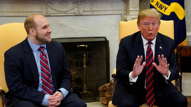 U.S. President Donald Trump talks to the media as he greet Josh Holt, an American missionary who was released by Venezuela, in the Oval Office of the White House in Washington