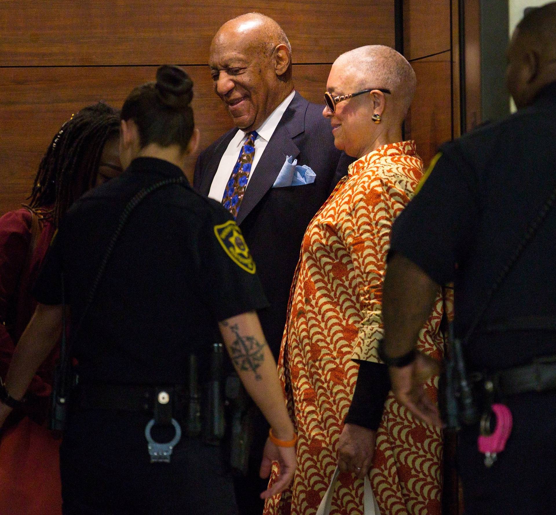 Bill Cosby and Camille Cosby ride the elevator at the Montgomery County Courthouse in Norristown