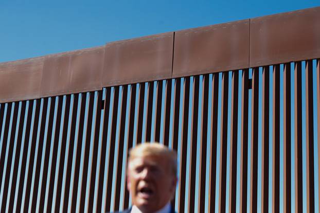 U.S. President Donald Trump visits a section of the U.S.-Mexico border wall in Otay Mesa