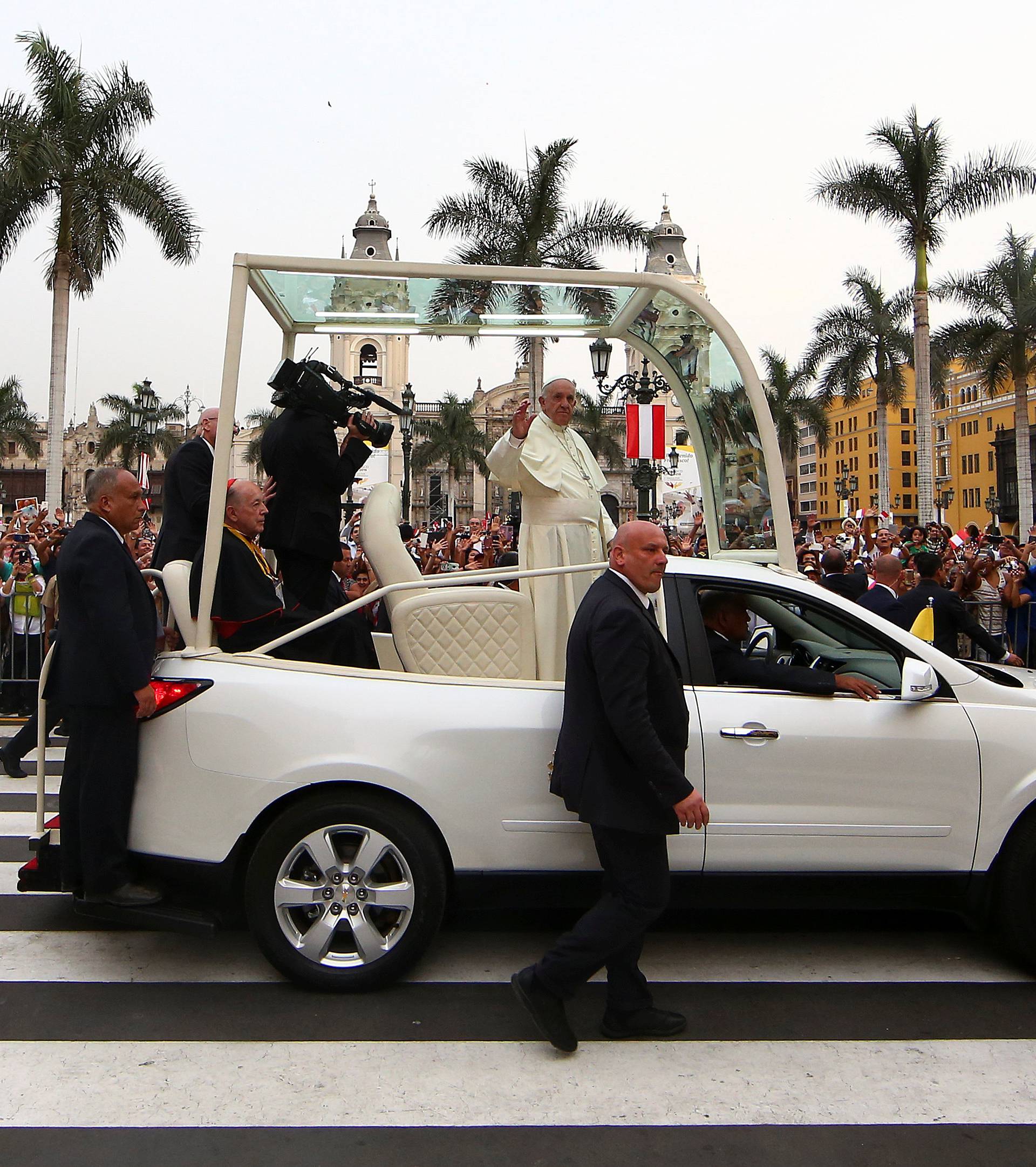 Pope Francis leaves after a meeting with Peru's President Pedro Pablo Kuczynski at the presidential palace in Lima