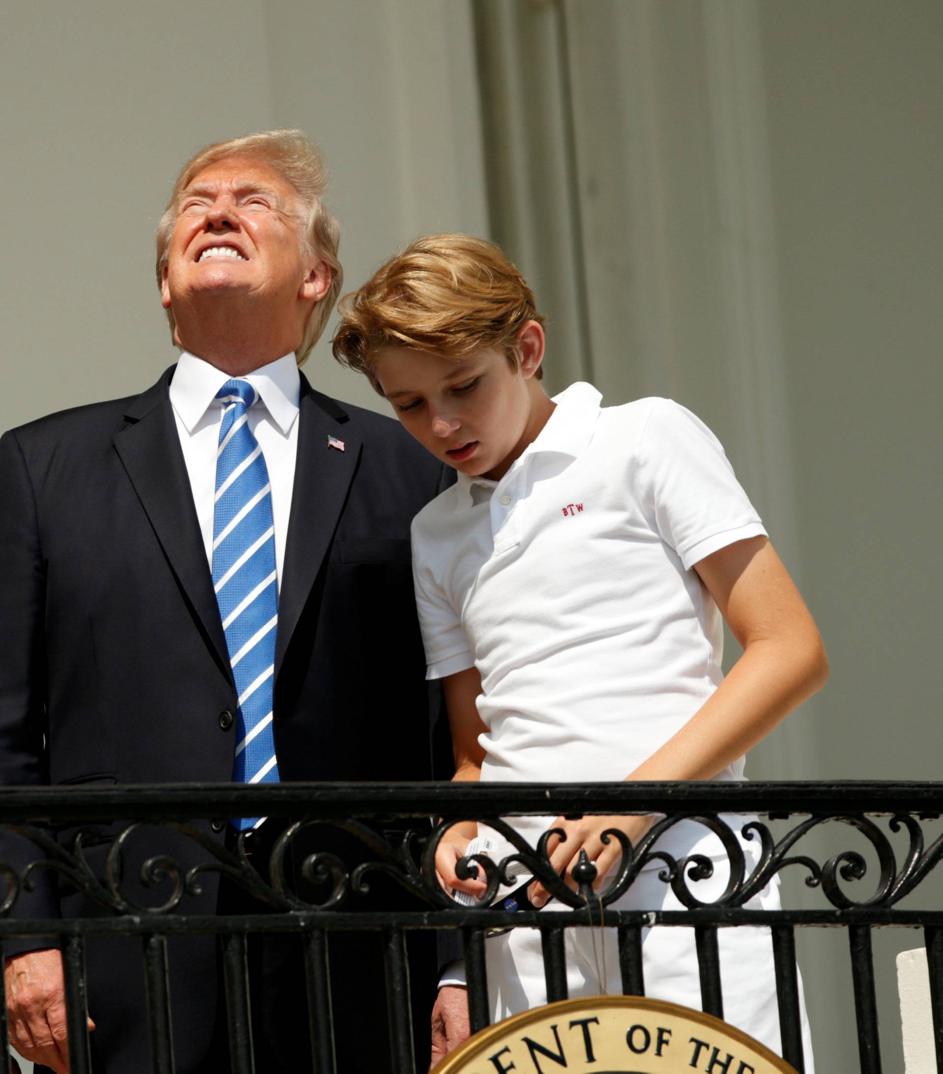 U.S. President Trump and family watch the solar eclipse from the White House in Washington