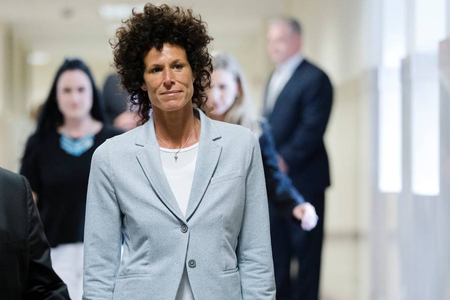 Andrea Constand walks to the courtroom during Bill Cosby's sexual assault trial at the Montgomery County Courthouse in Norristown