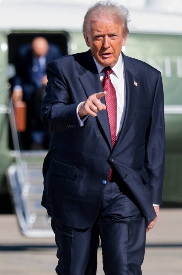U.S. President Trump boards Air Force One as he departs for Florida from Joint Base Andrews