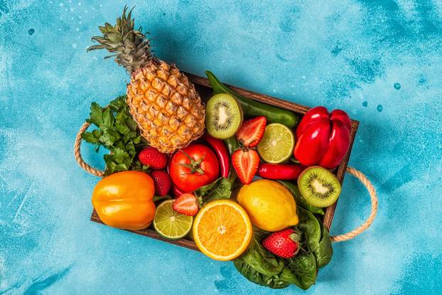 Fruits and vegetables rich in vitamin C in box. 