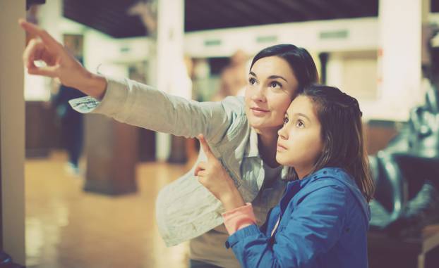 Woman and girl in museum