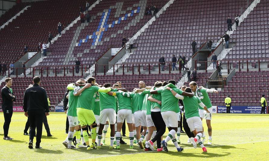Celtic manager Brendan Rodgers and their players celebrate winning the Scottish Premiership