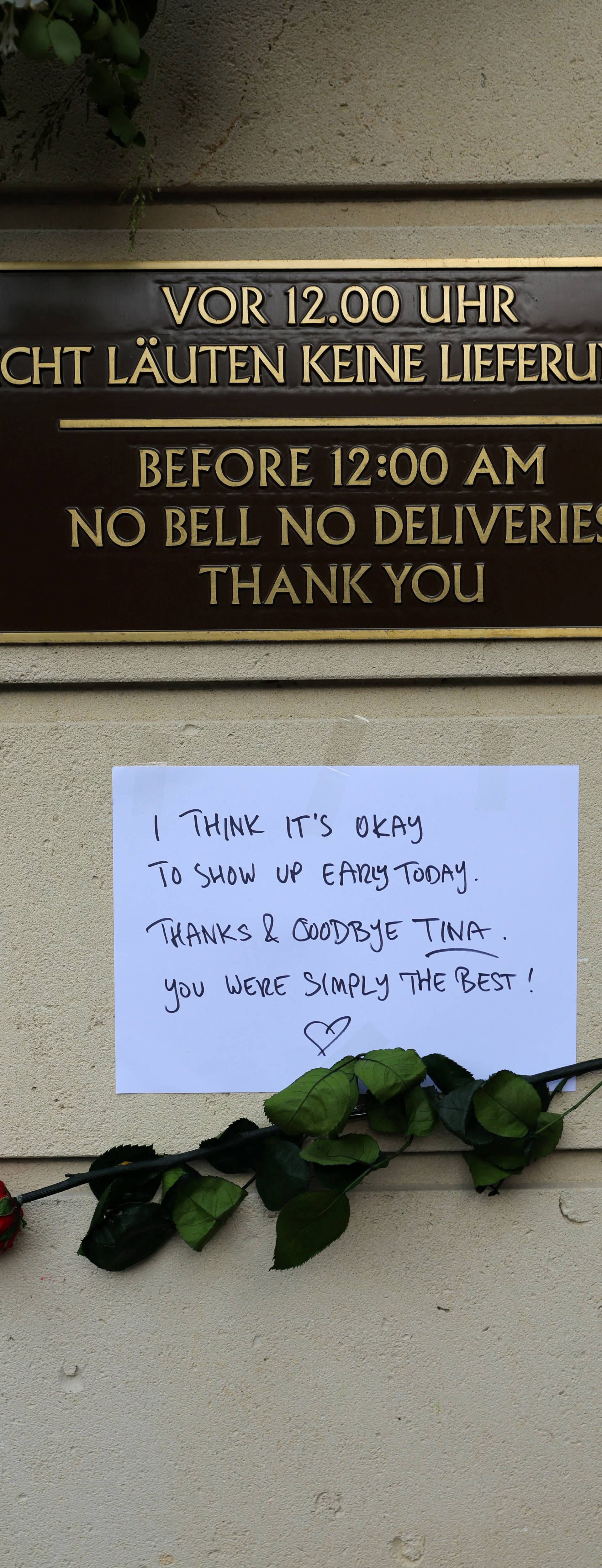 People lay flowers and candles in front of the home of late singer Tina Turner in Kuesnacht