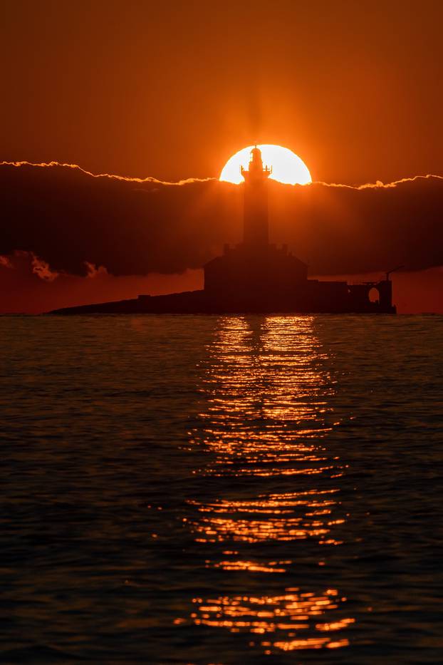 Premantura: Zalazak sunca s pogledom na svjetionik Porer