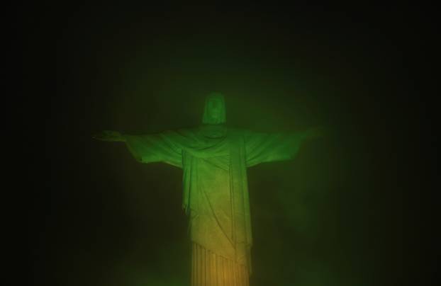 Christ the Redeemer statue is lit up in Brazilian colours as a tribute to late Pele in Rio De Janeiro