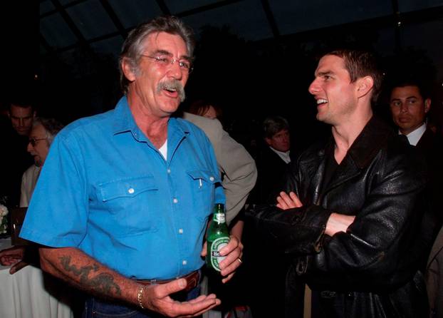 FILE PHOTO R. Lee Ermey of "Full Metal Jacket" and Tom Cruise of "Eyes Wide Shut" talk together at a reception in Los Angeles
