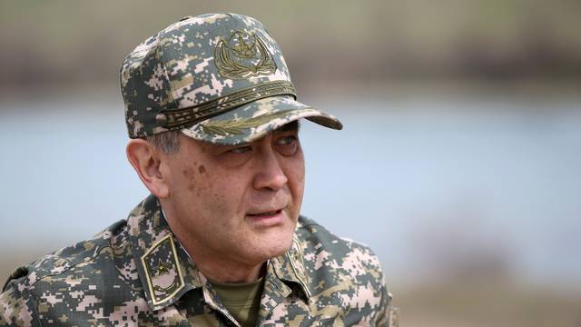 FILE PHOTO: Kazakh Defence Minister Yermekbayev attends military exercises held by assault troops in Almaty Region