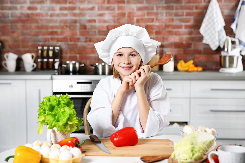 Cute,Girl,Cooking,In,Kitchen,At,Home