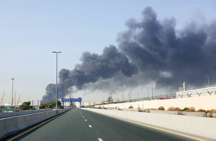 Smoke billows from Jebel Ali port after an Iranian attack, following United States and Israel strikes on Iran, in Dubai