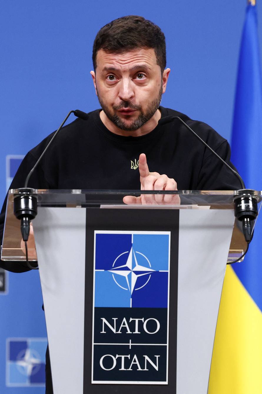 Ukraine's President Volodymyr Zelenskiy attends a press conference, in Brussels