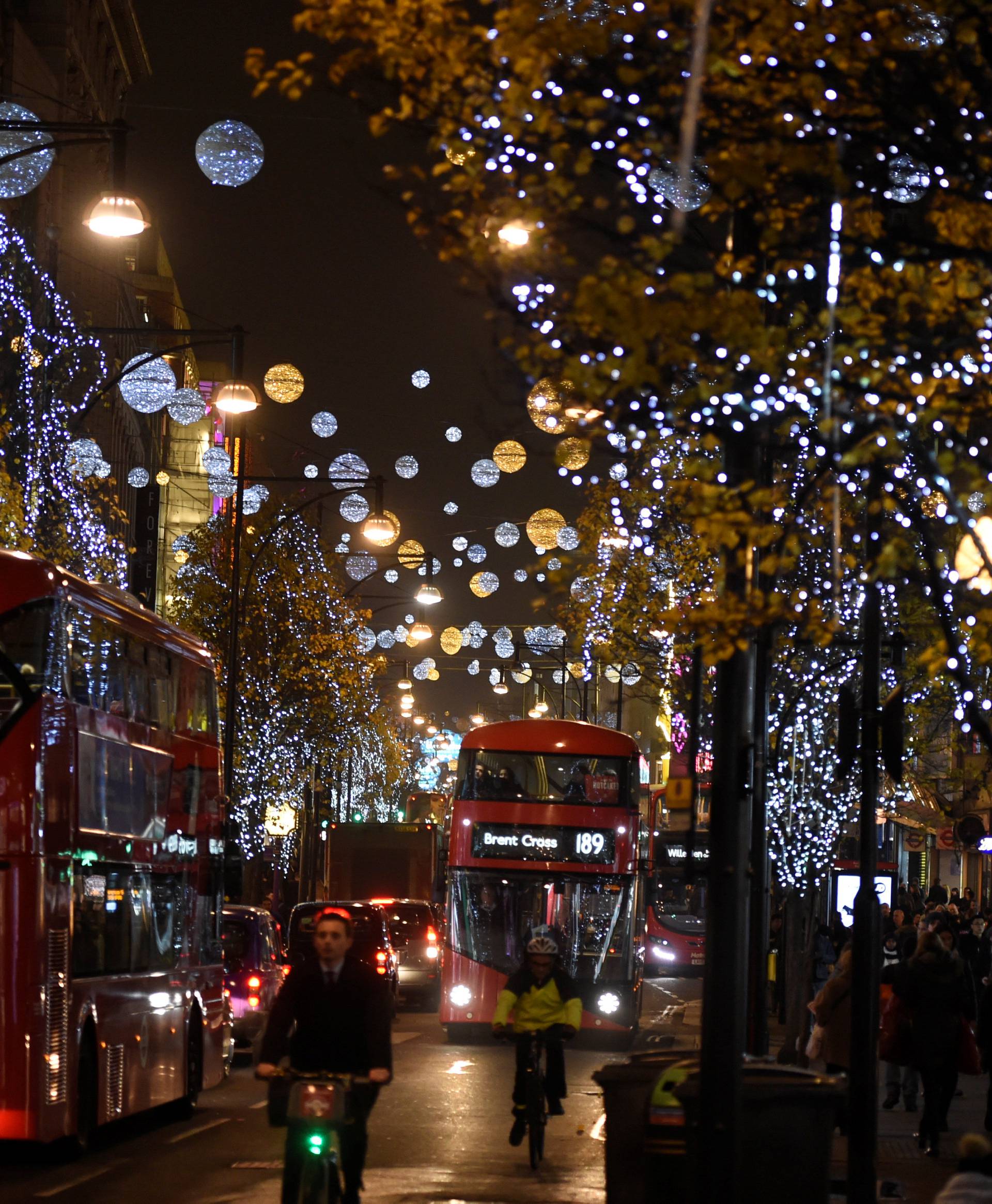 Christmas lights are seen illuminated on Oxford Street in London