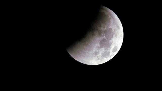 "Super Blue Blood Moon" is seen during a lunar eclipse over Shanghai
