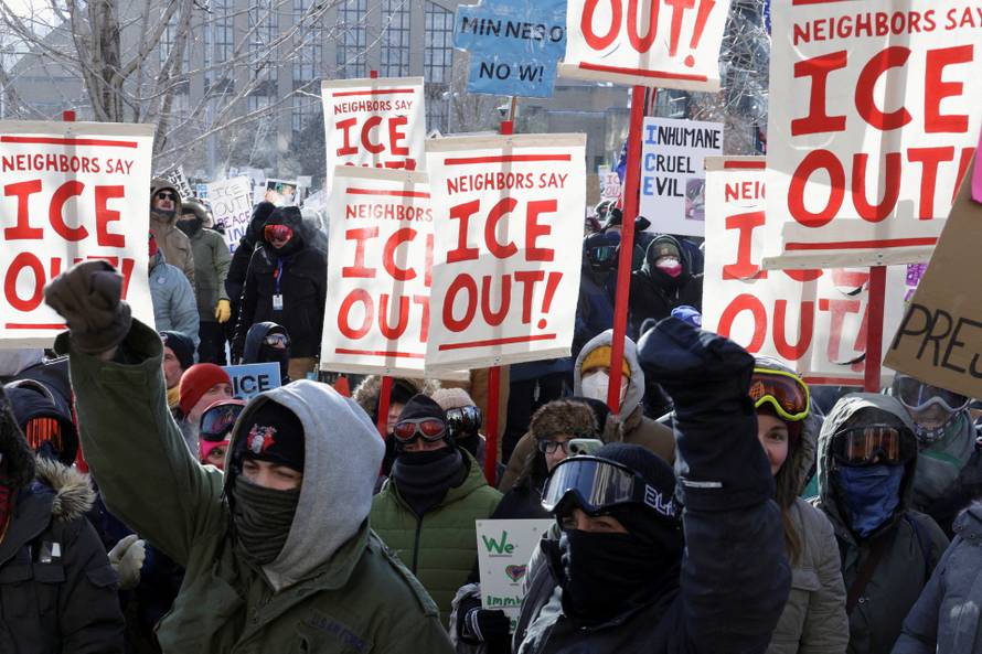 People protest U.S. President Donald Trump's deployment of thousands of immigration enforcement officers on the streets of Minneapolis