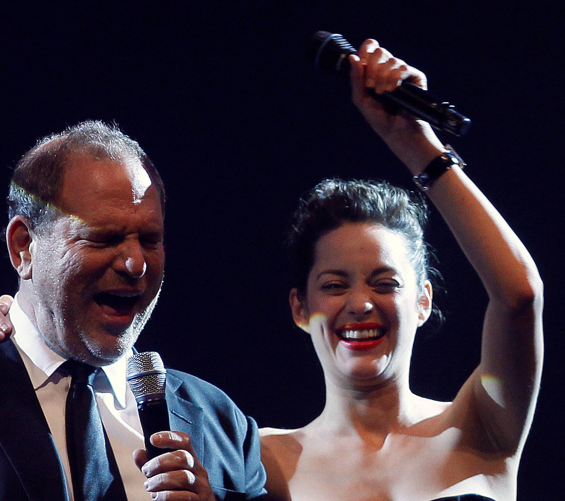 FILE PHOTO: Actress Cotillard and producer Weinstein lead an auction at the amfAR's Cinema Against AIDS 2010 event in Antibes