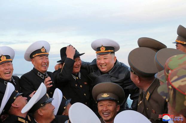 North Korea's leader Kim Jong Un attends the opening ceremony of the Ryonpho Greenhouse Farm