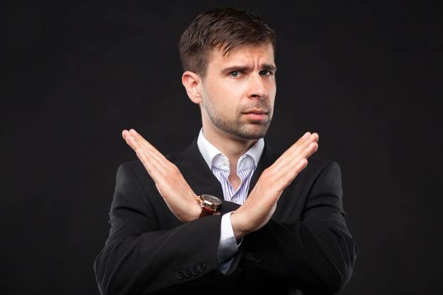 Young businessman in a black suit