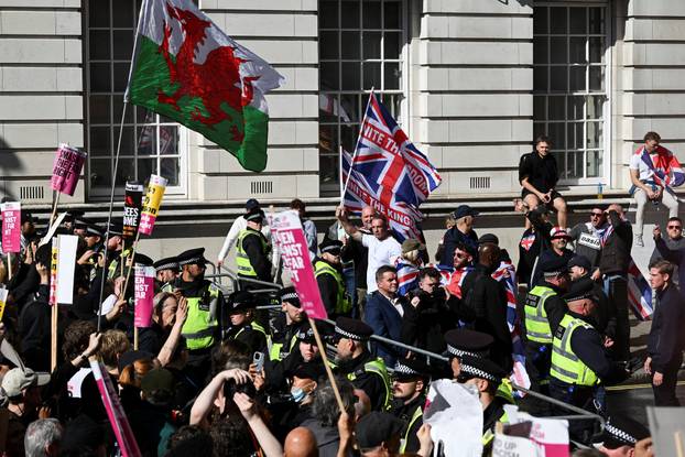 Anti-racism protesters gather to counter anti-immigration rally led by Tommy Robinson, in London