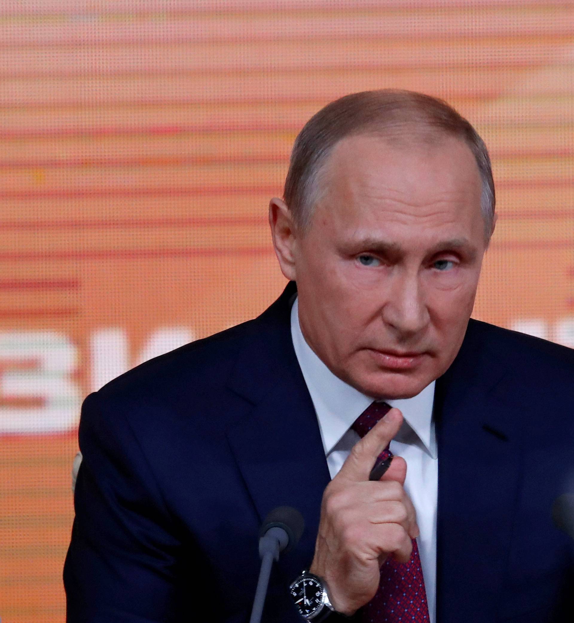 Russian President Vladimir Putin speaks during his annual end-of-year news conference in Moscow