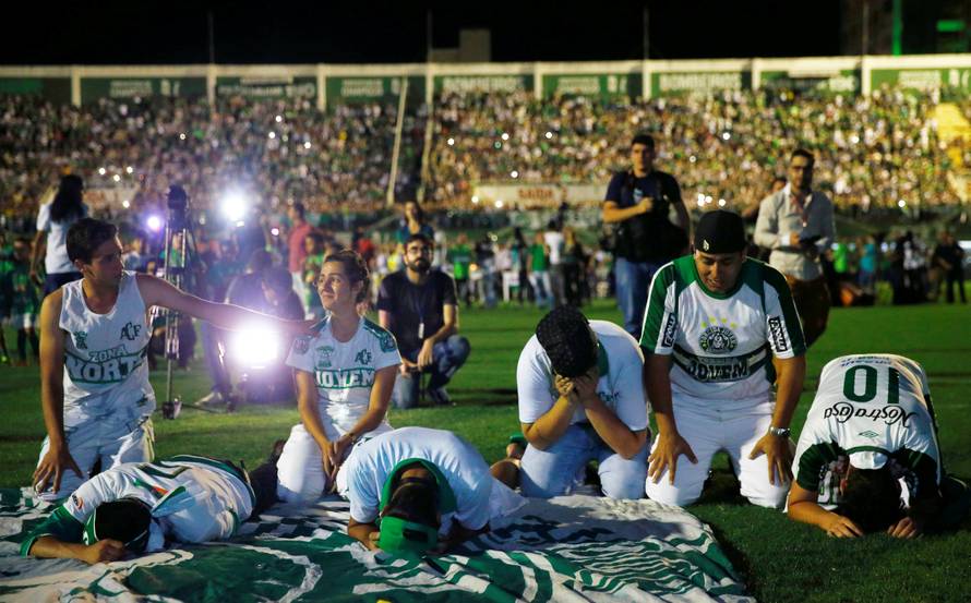 Fans of Chapecoense soccer team pay tribute to Chapecoense's players at the Arena Conda stadium in Chapeco