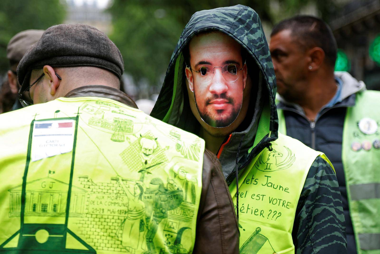 Protesters wearing yellow vests attend a demonstration in Paris