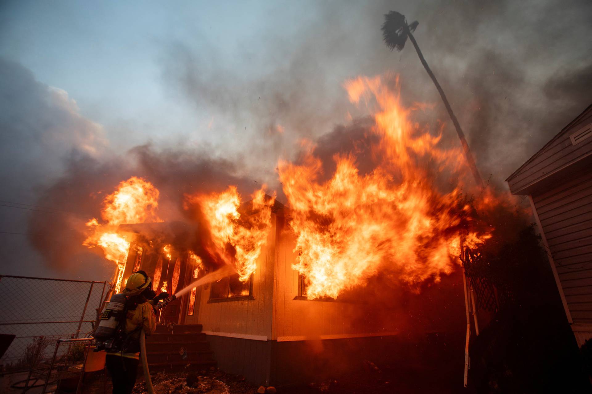 Palisades Fire burns during a windstorm on the west side of Los Angeles