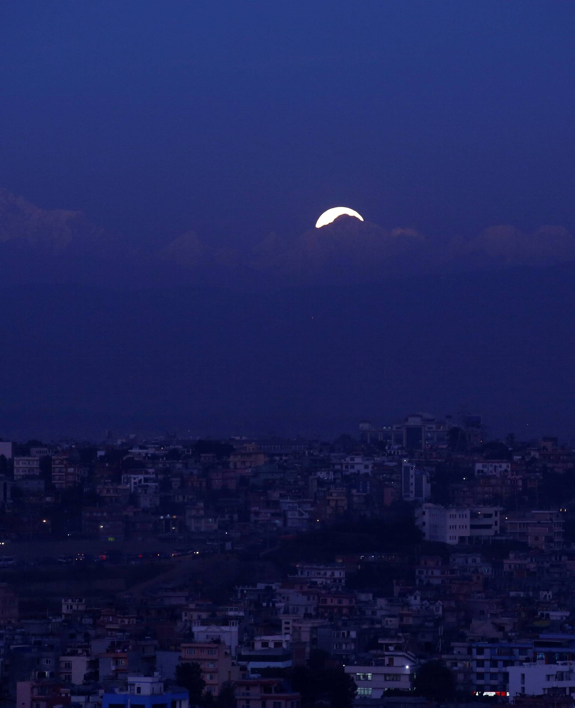 The "supermoon" rise above the valley in Kathmandu