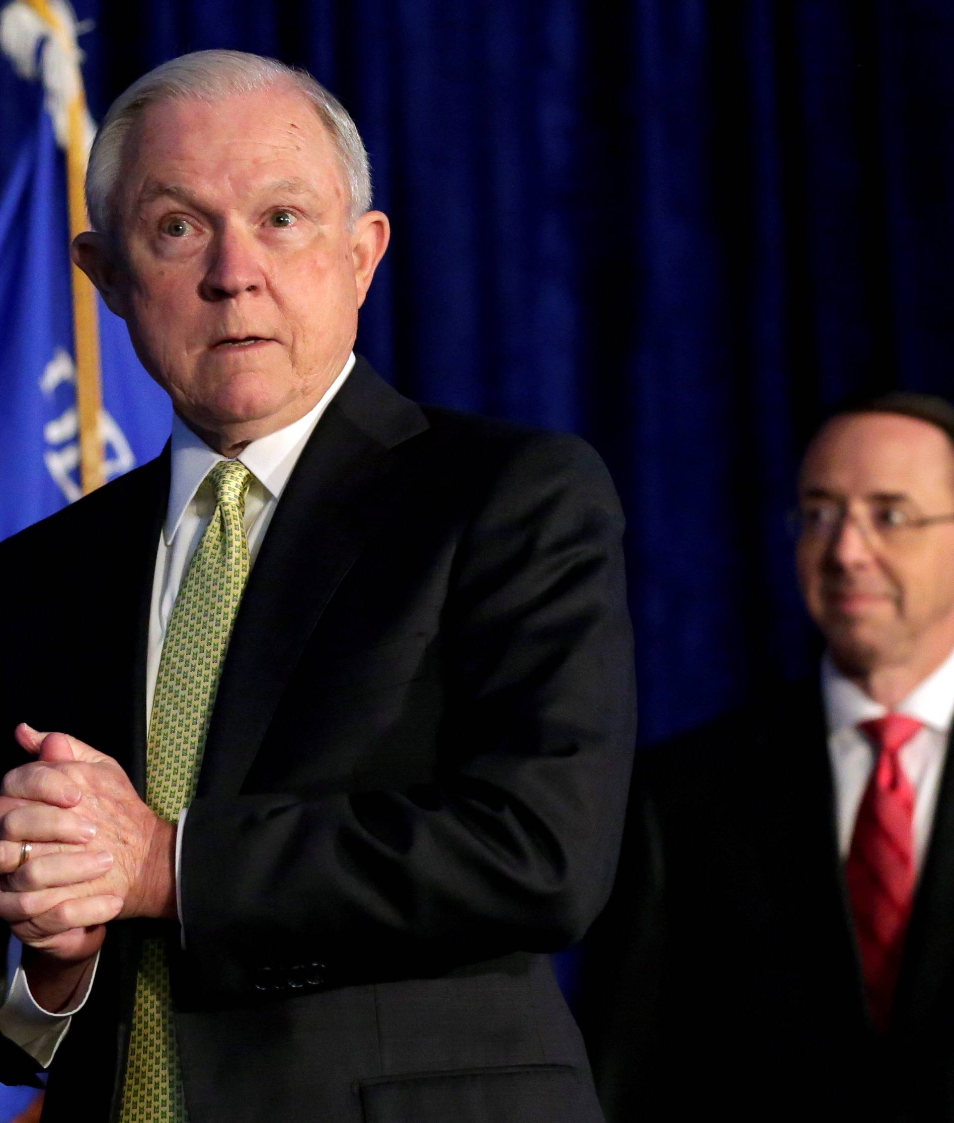 FILE PHOTO: Attorney General Jeff Sessions and Deputy Attorney General Rod Rosenstein arrive at a summit on crime reduction