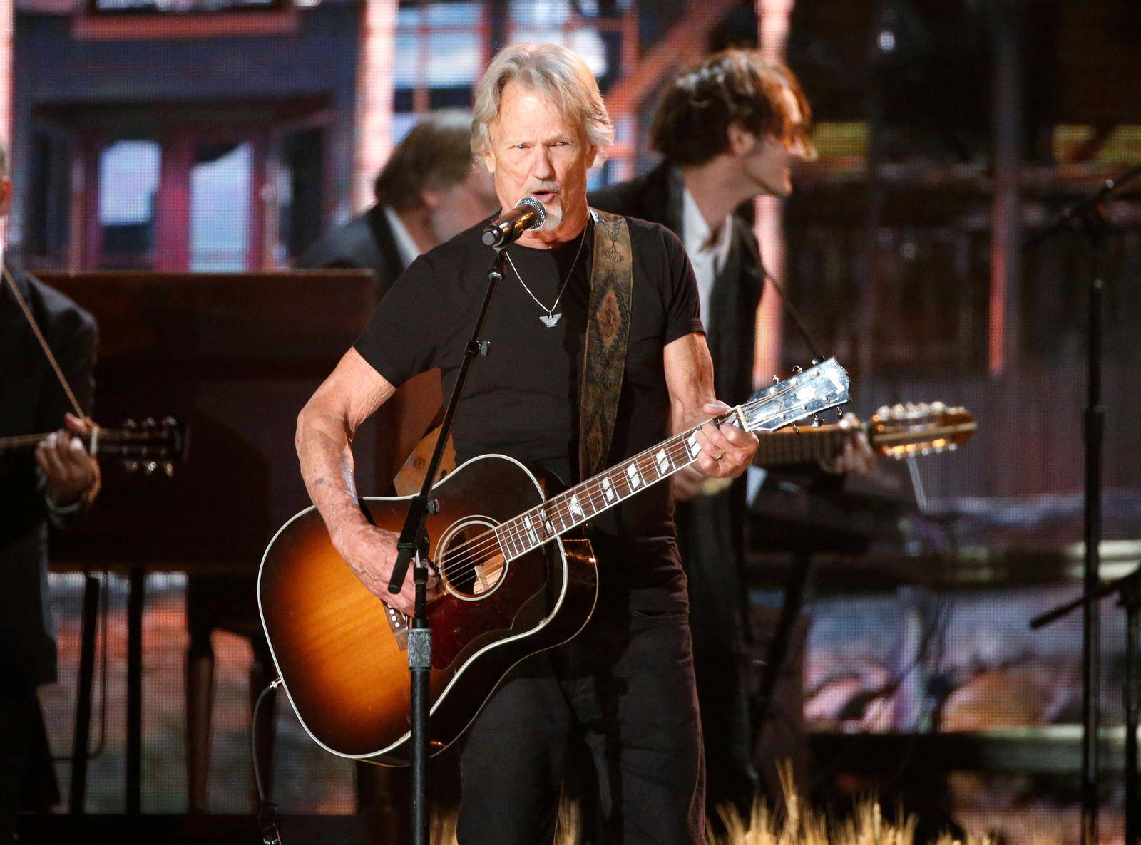 FILE PHOTO: Kris Kristofferson performs at the 56th annual Grammy Awards in Los Angeles