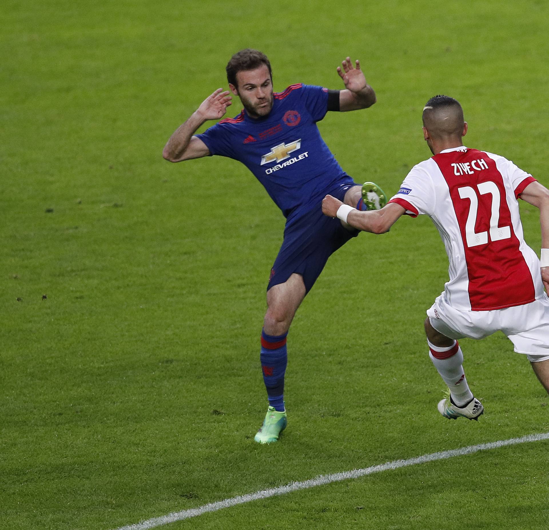 Manchester United's Juan Mata in action with Ajax's Hakim Ziyech