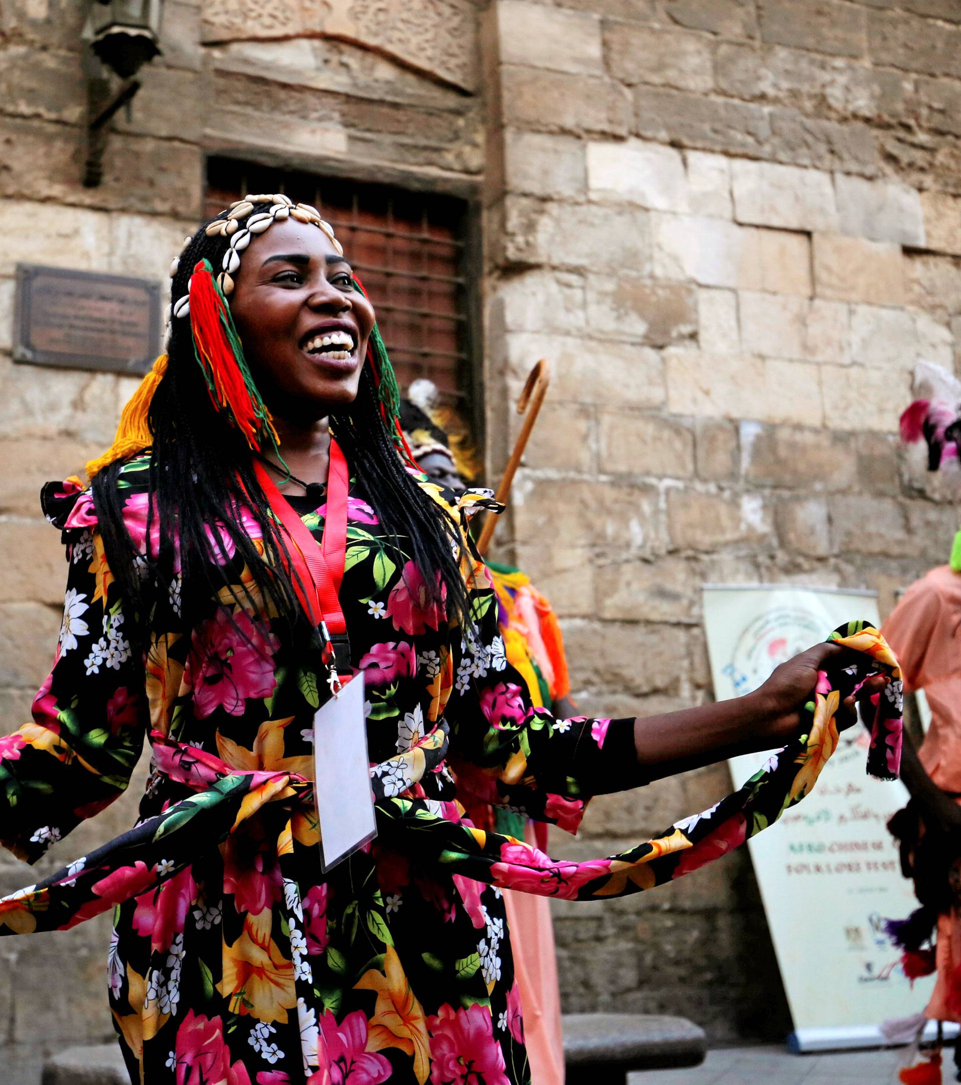 Members of a Sudanese and Eritrean dance group perform a traditional folk dance during the African-Chinese cultural festival, organised by Egypt's Ministry of Tourism, on the historic Moez Street, in Cairo