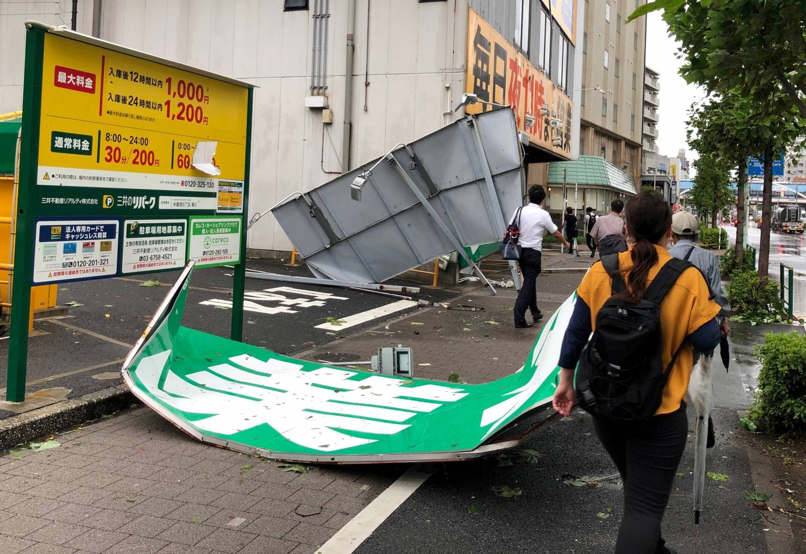 Collapsed steel advertising boards caused by Typhoon Faxai are seen at Edogawa ward in Tokyo, Japan