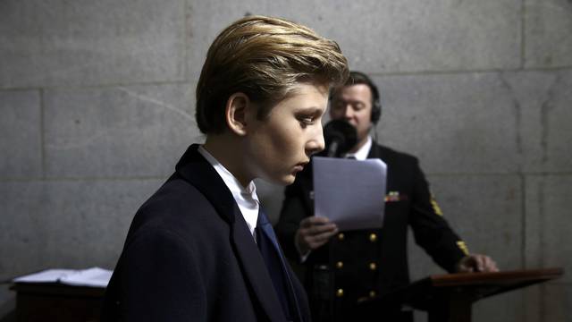 Barron Trump arrives on the West Front of the U.S. Capitol