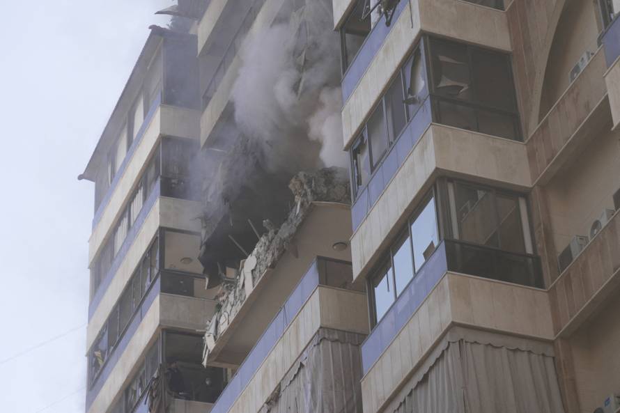 Smoke rises from a building following an Israeli air strike in Beirut