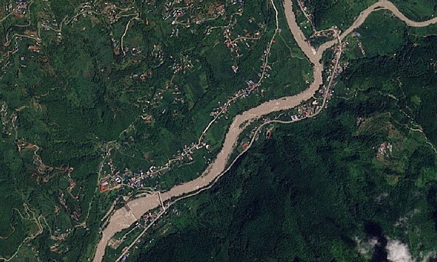Satellite image shows Tupche before a flash flood