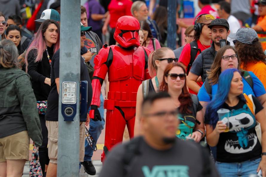 An attendee of the pop culture festival Comic Con International arrives in costume for opening night in San Diego, California