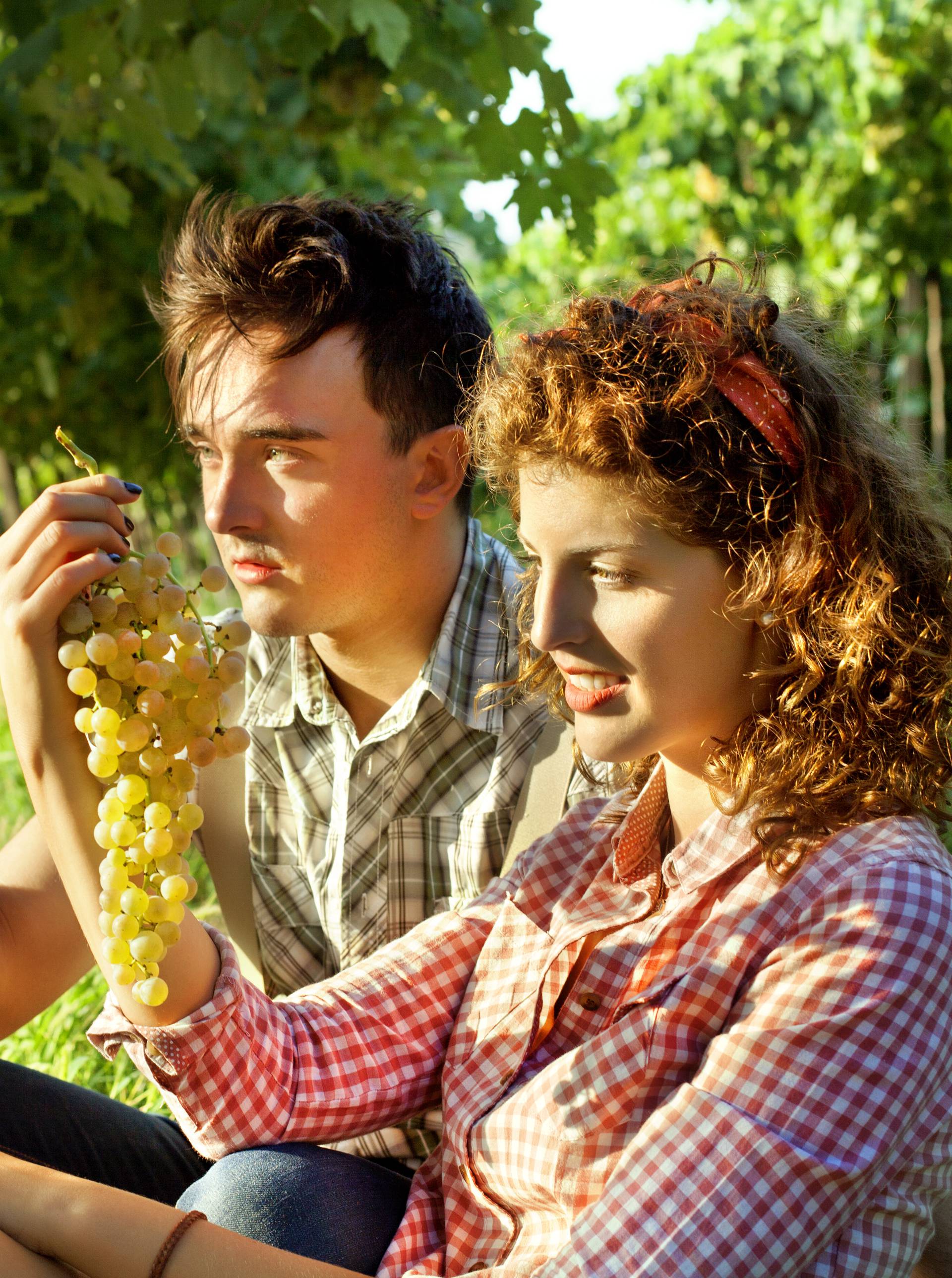 farming couple relaxing after the grape harvest