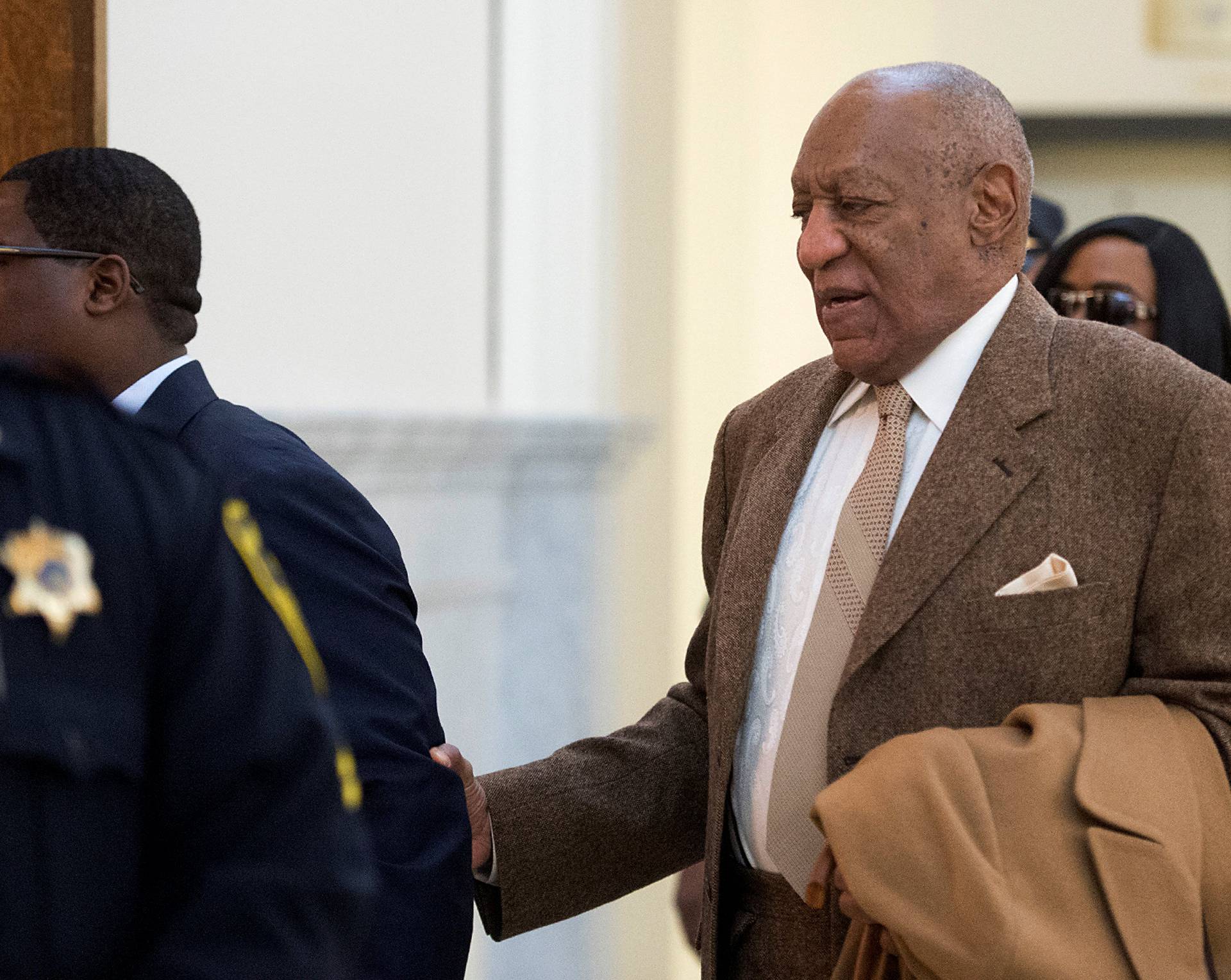 Cosby enters Montgomery County Courthouse for the second day of his pre-trial hearing in his sexual assault case in Norristown