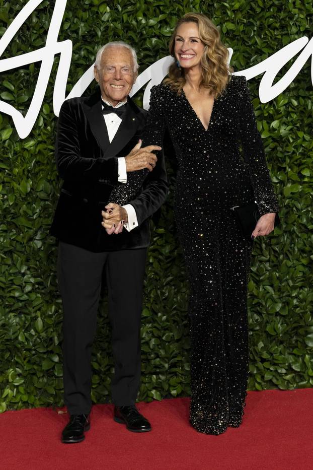 Giorgio Armani and Julia Roberts attend The Fashion Awards 2019 at The Royal Albert Hall. London, UK. 02/12/2019