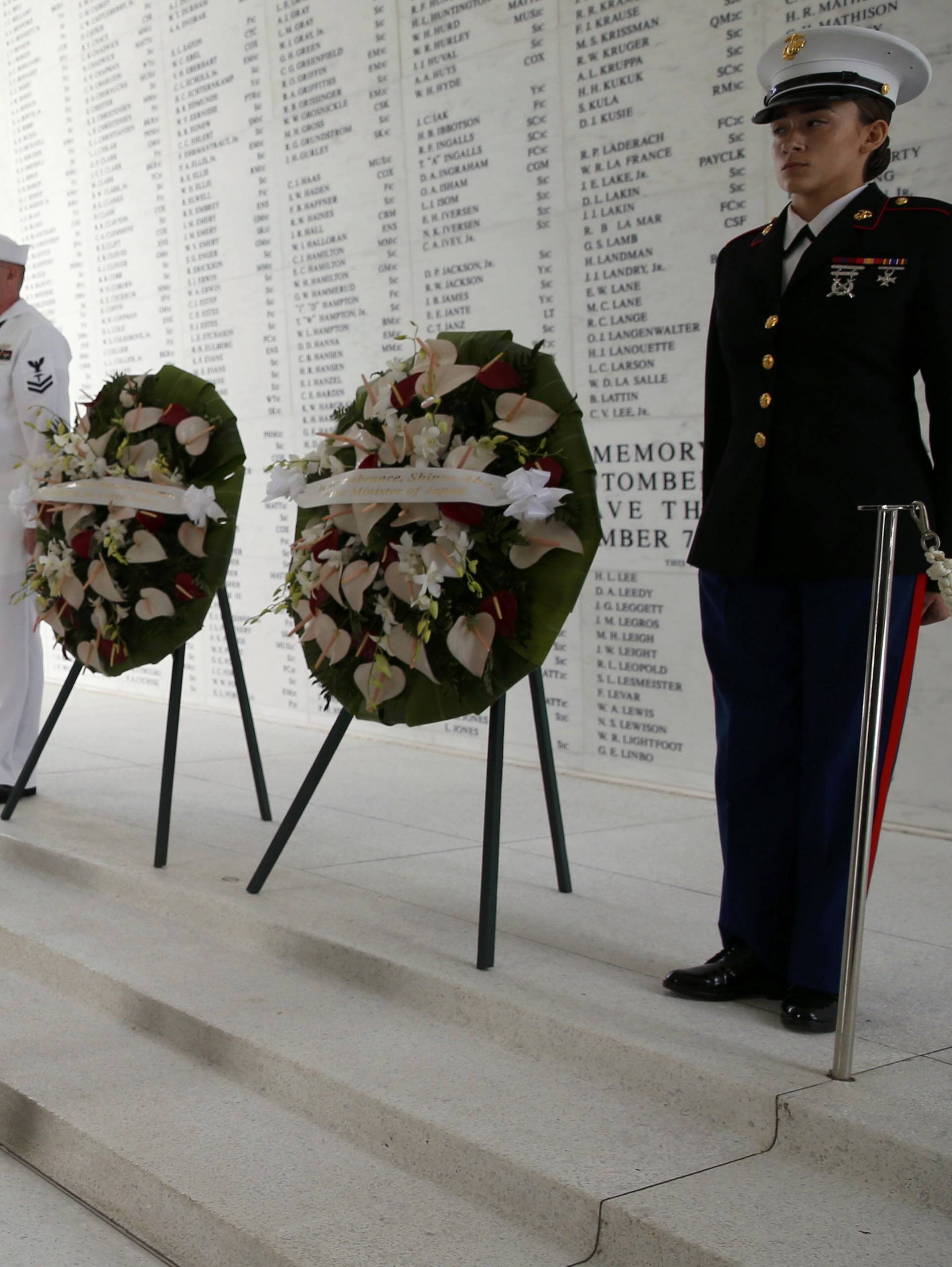 U.S. President Obama and Japanese Prime Minister Abe participate in wreath-laying ceremony aboard USS Arizona Memorial at Pearl Harbor