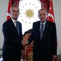 Turkey's President Tayyip Erdogan shakes hands with NATO Secretary General Jens Stoltenberg in Istanbul